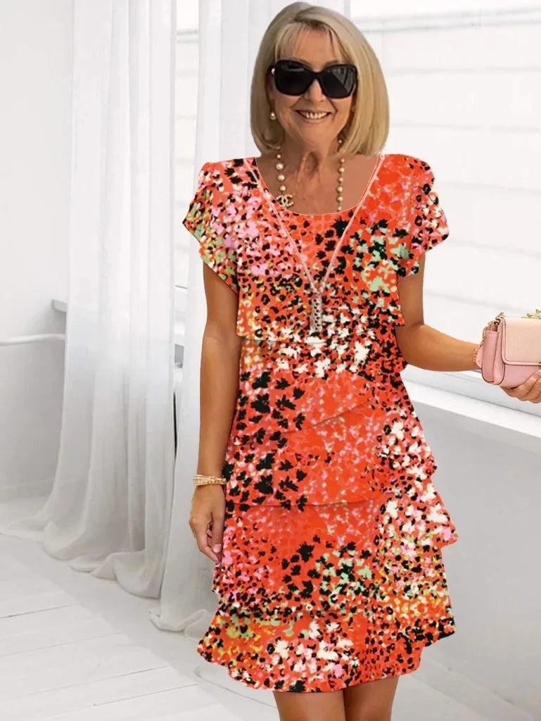 Alba – Elegante vestido vaporoso con volantes