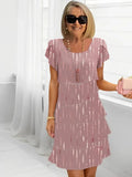 Silvia – Elegante vestido vaporoso con volantes